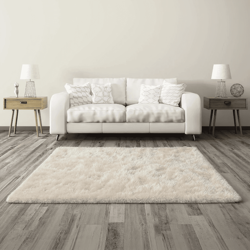 Custom-bound area rug over a Naples wood floor