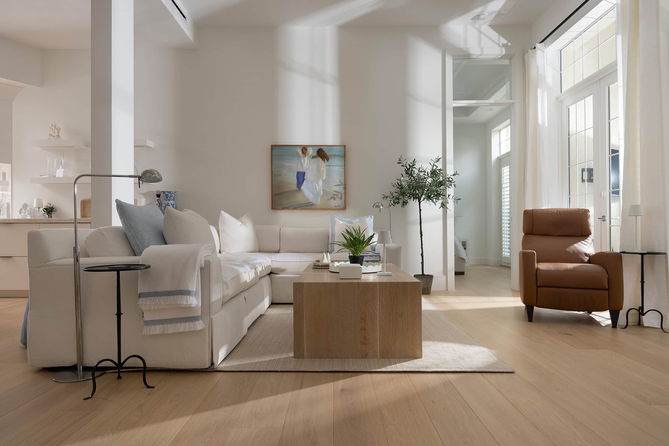 7th Avenue living room with hardwood flooring