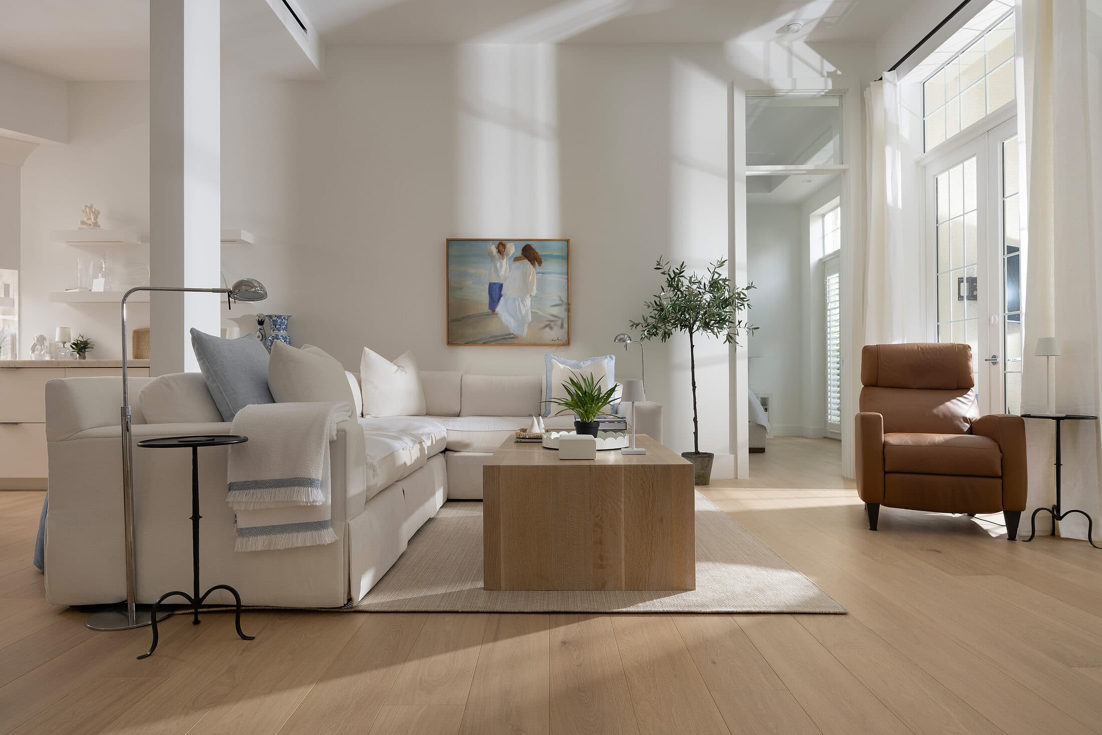 7th Avenue living room with hardwood flooring