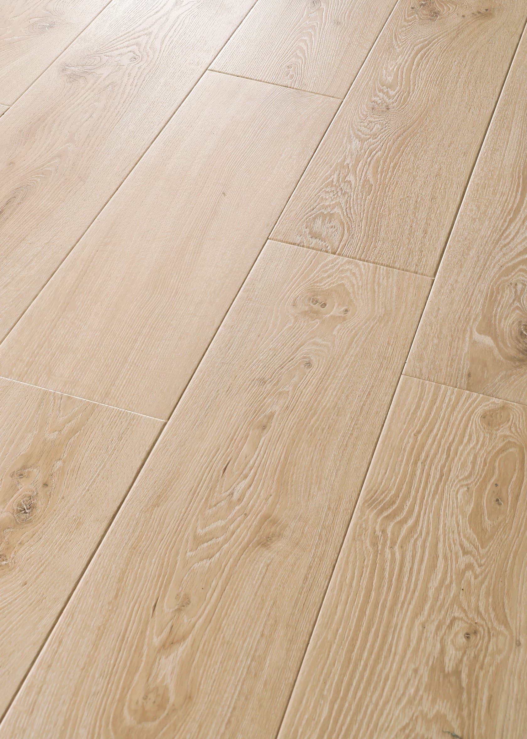Light oak-look luxury vinyl wide plank, close detail of the grain — Pine Ridge, Naples