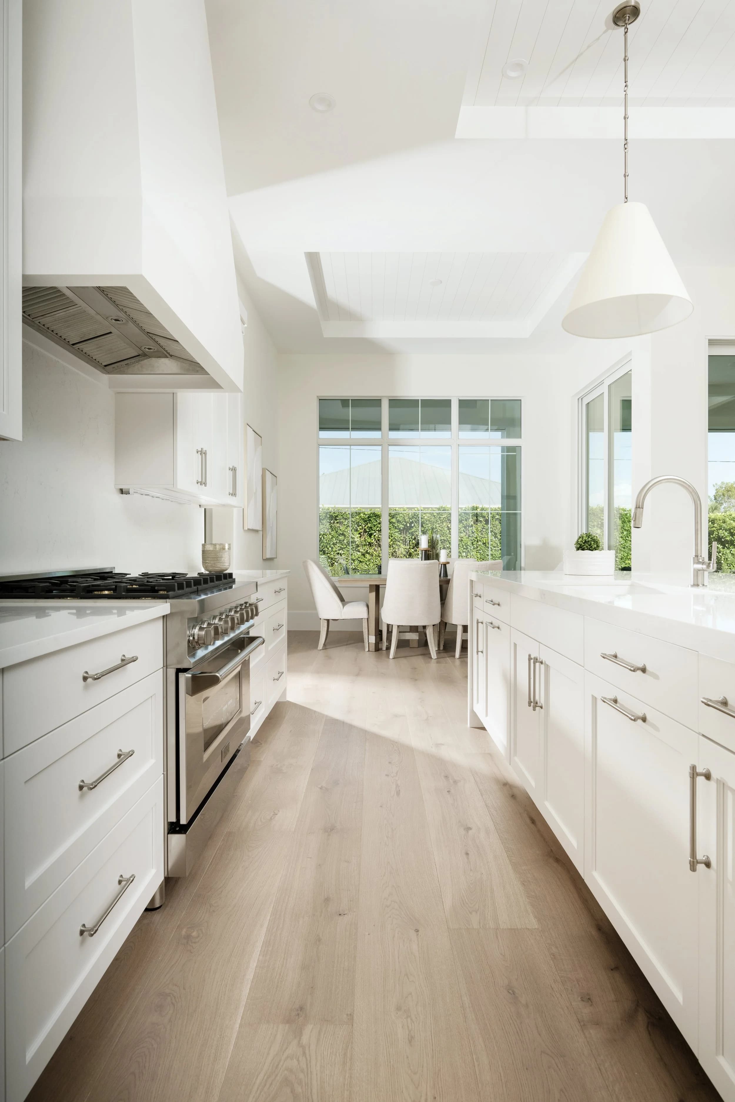 Bright Naples kitchen with RIVA factory-lacquered European white oak — uniform low sheen, sealed surface