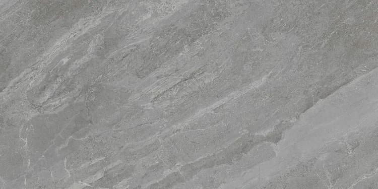 Grey stone-look porcelain, close enough to read the movement in the surface