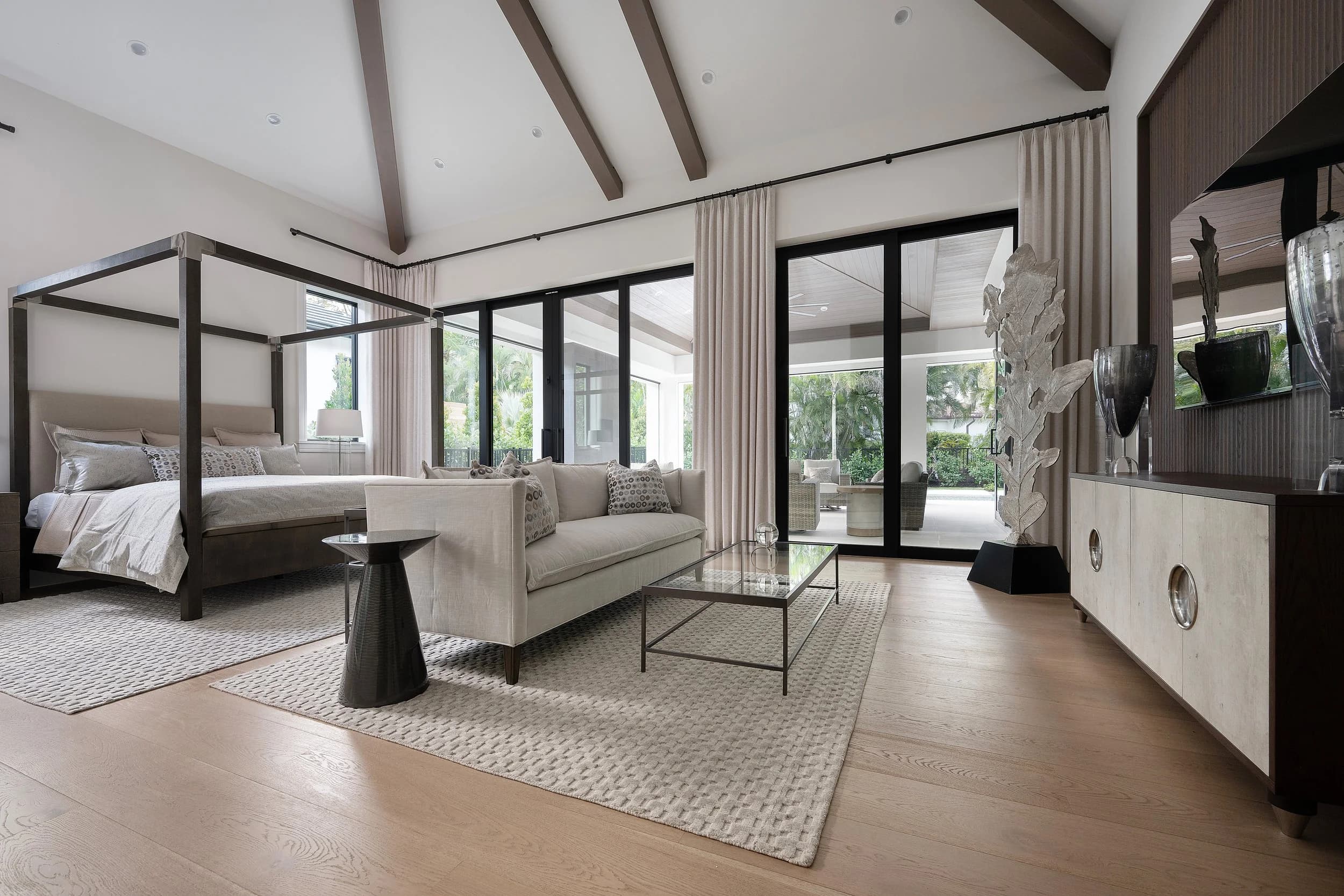 Primary suite. Floor-to-ceiling glass, oak quiet underfoot.