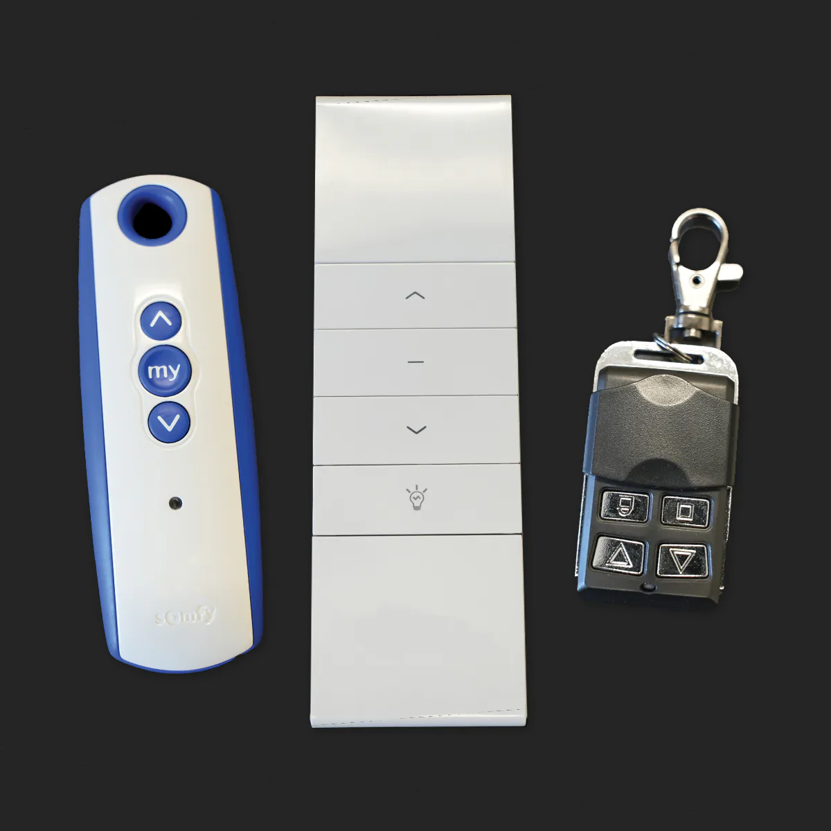 Three Somfy hand-held controls for motorized awnings